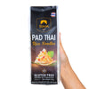 Hand holding a package of Siam Pad Thai Rice Noodles on a white background